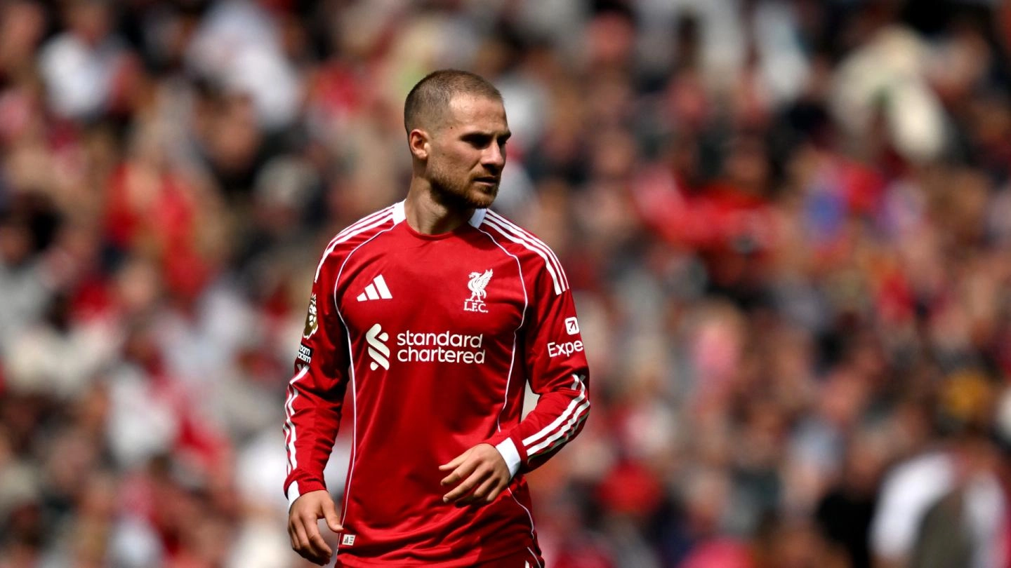 Joueur de Liverpool en action Joueur de Liverpool en action